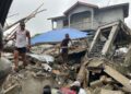 Three-story building collapses in Kamayama